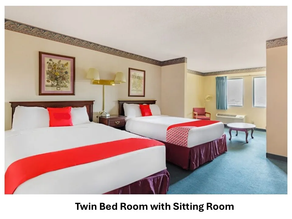 A furnished suite at The View Branson with beds and space to settle in